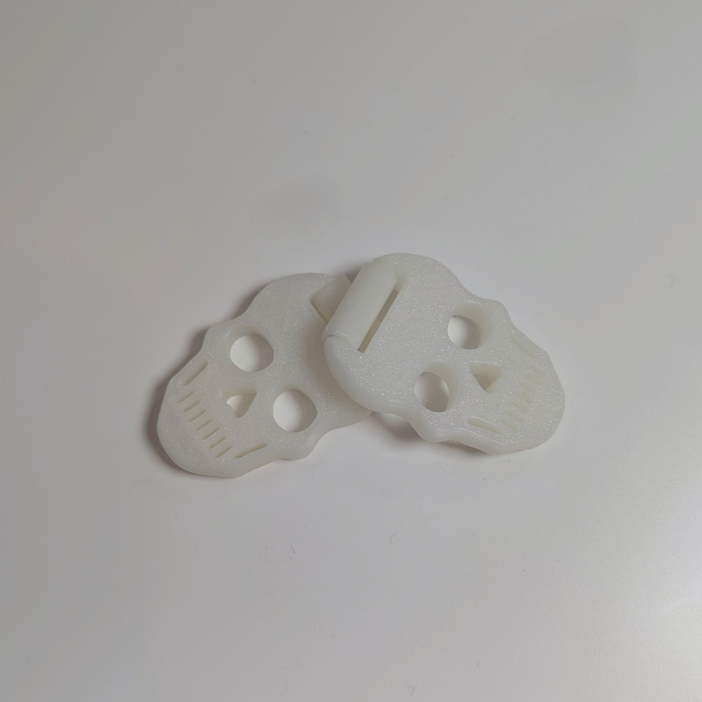 Glow in the dark skull flipper