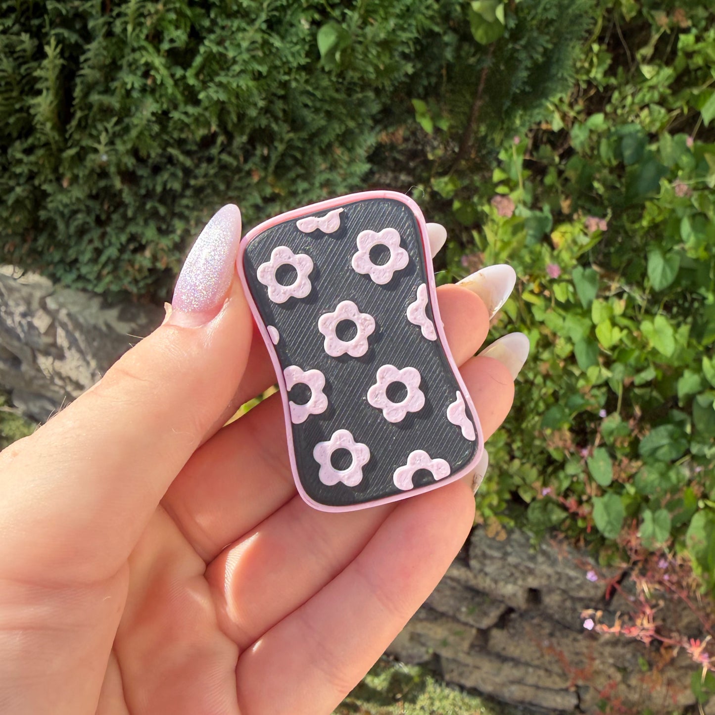 Pink and black flower magnetic slider