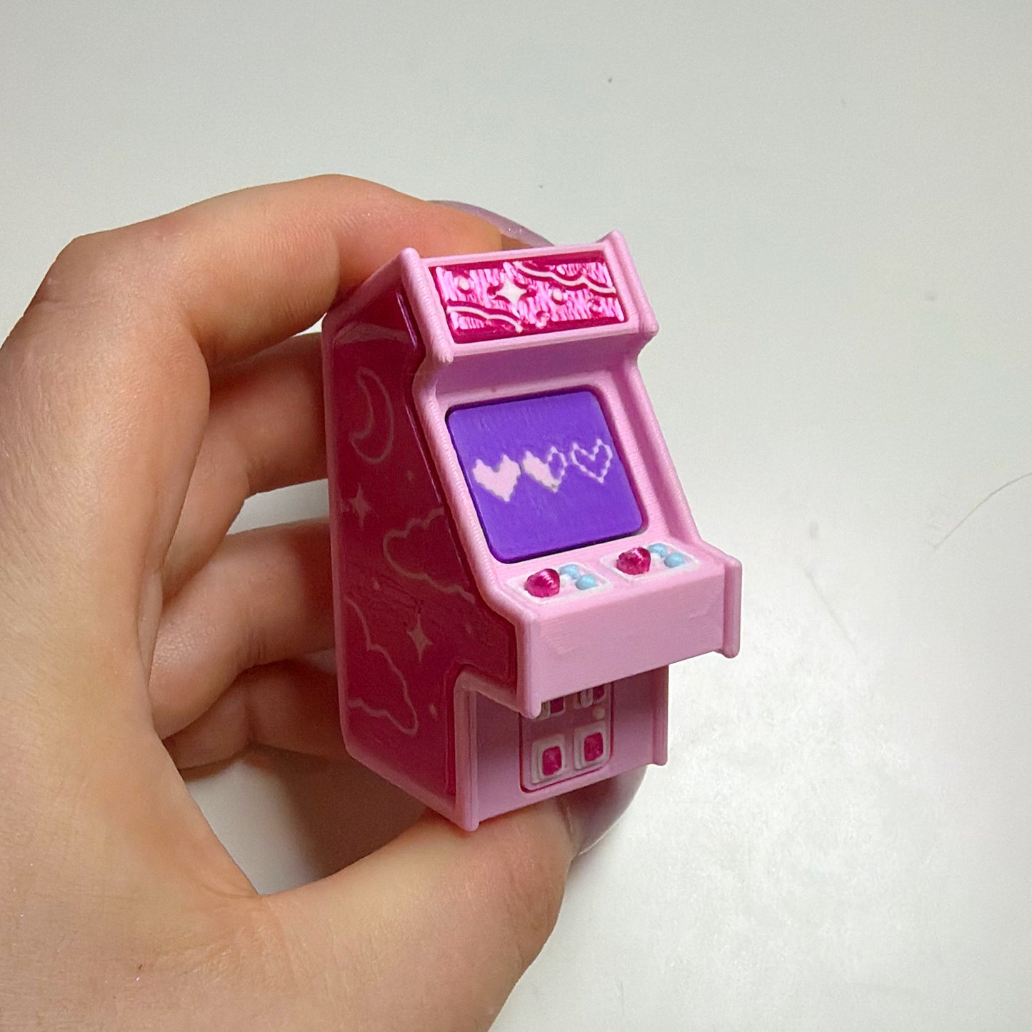Pink retro arcade machine clicker