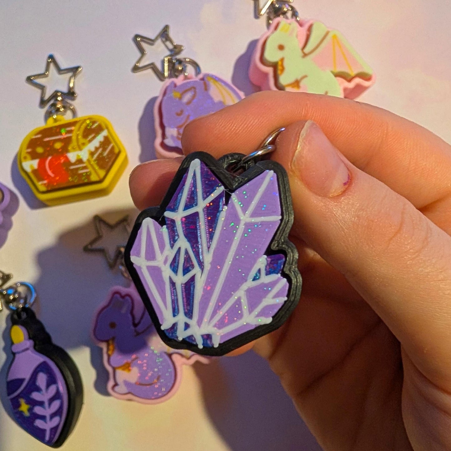 Fantasy dungeon D&D dungeons and dragons inspired fidget clicker keychains! Sparkly, glittery gift