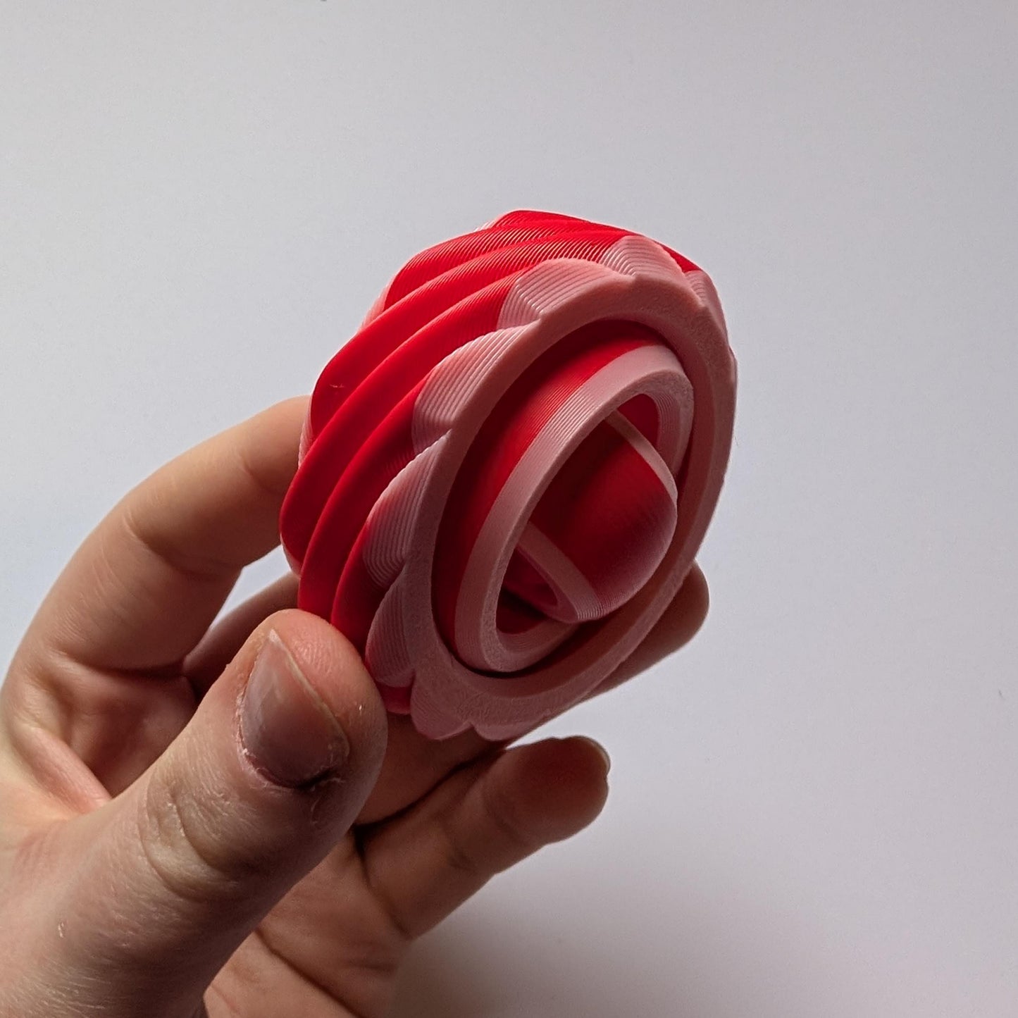 Textured Sensory Gyro fidget spinner toy.