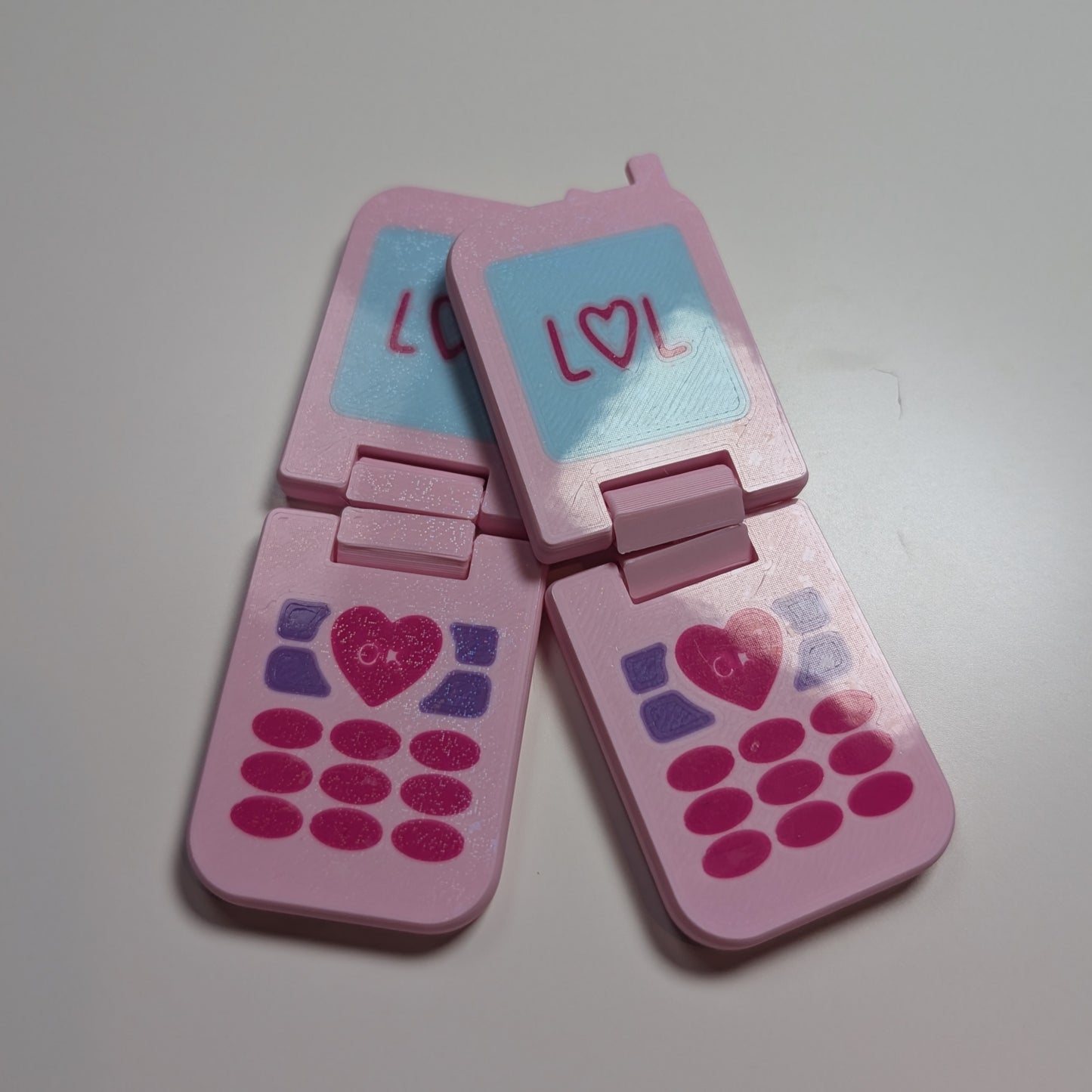Sparkly flip phone flipper