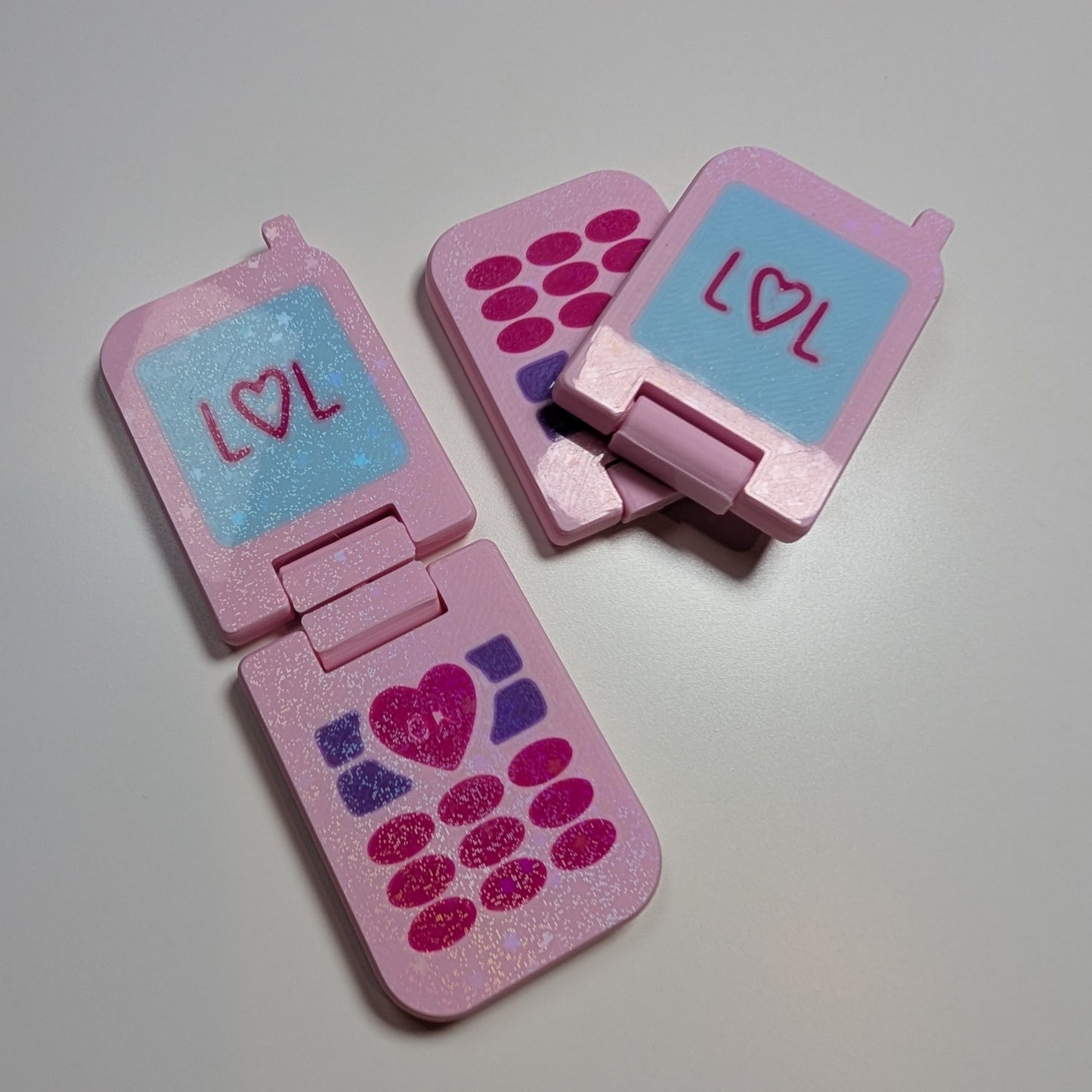 Sparkly flip phone flipper